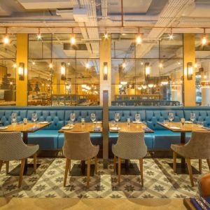 Modern dining area perfect for coworking at DoubleTree by Hilton London Kingston upon Thames.