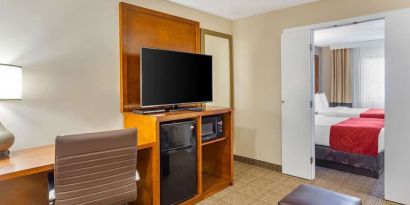 Spacious king room with TV at Comfort Suites Oakbrook Terrace.