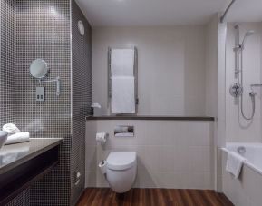 Guest bathroom with shower at DoubleTree By Hilton Stratford-upon-Avon.