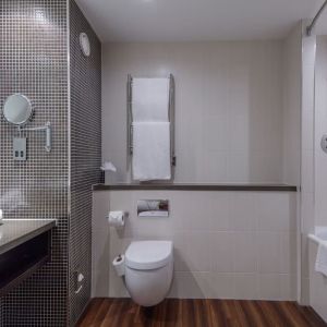 Guest bathroom with shower at DoubleTree By Hilton Stratford-upon-Avon.