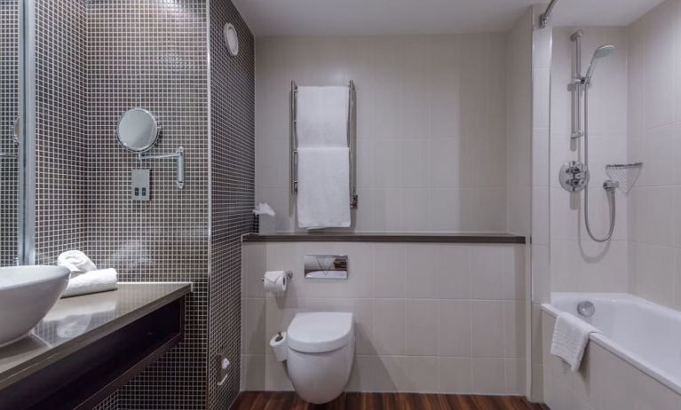 Guest bathroom with shower at DoubleTree By Hilton Stratford-upon-Avon.