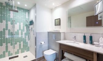 Guest bathroom with shower at DoubleTree By Hilton Nottingham - Gateway.