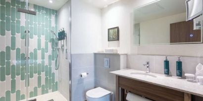 Guest bathroom with shower at DoubleTree By Hilton Nottingham - Gateway.