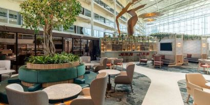 Dining area perfect for coworking  at Hilton London Heathrow Airport.