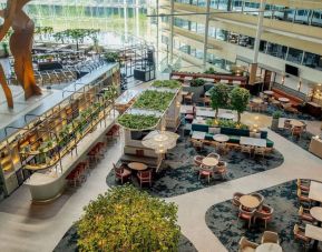 Restaurant and bar view from above at Hilton London Heathrow Airport.