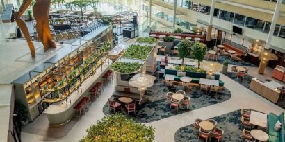 Restaurant and bar view from above at Hilton London Heathrow Airport.