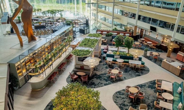 Restaurant and bar view from above at Hilton London Heathrow Airport.