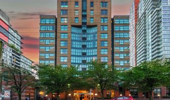 Hotel exterior and city view at Grand Park Hotel & Suites Downtown Vancouver.