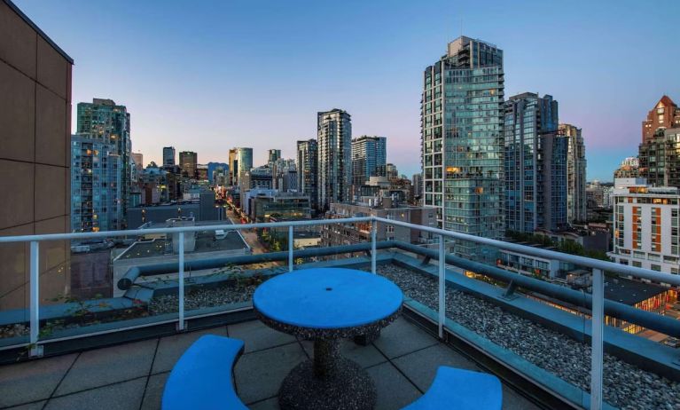 Hotel rooftop with city view at Grand Park Hotel & Suites Downtown Vancouver.