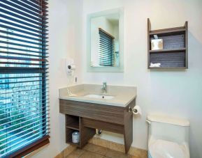 Guest bathroom at Grand Park Hotel & Suites Downtown Vancouver.