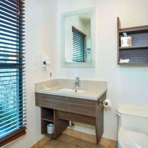 Guest bathroom at Grand Park Hotel & Suites Downtown Vancouver.