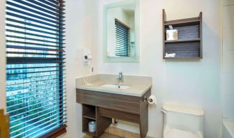 Guest bathroom at Grand Park Hotel & Suites Downtown Vancouver.