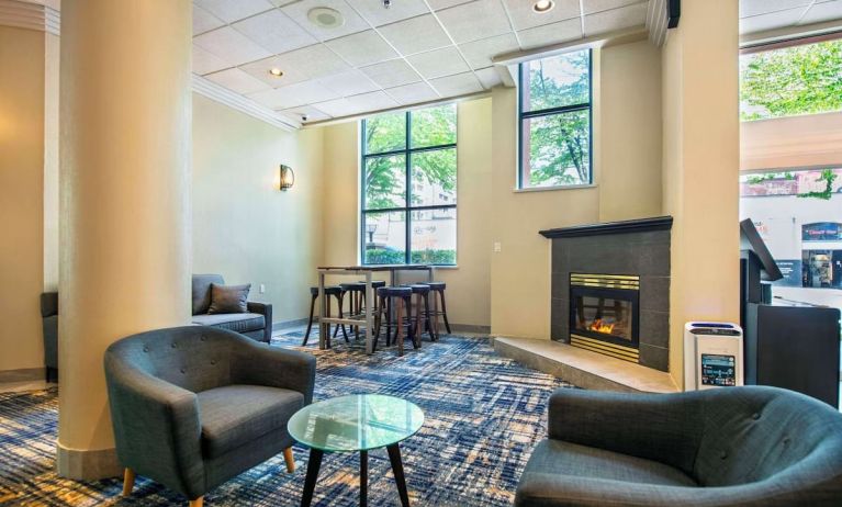 Lounge and fireplace at Grand Park Hotel & Suites Downtown Vancouver.