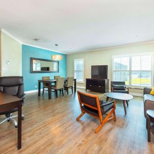 Spacious king suite with work space at Grand Park Hotel & Suites Downtown Vancouver.