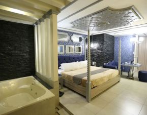 King room with jacuzzi tub at Victoria Court Suites.