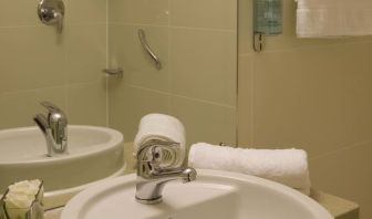 Guest bathroom with shower at Leonardo Hotel Aberdeen.