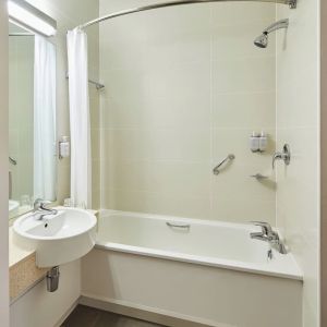 Guest bathroom with shower at  Leonardo Hotel Bradford.