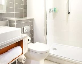 Guest bathroom with shower at Leonardo Hotel Belfast.
