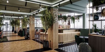 Lobby and coworking lounge at Leonardo Royal Hotel Birmingham.