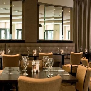 Dining area perfect for coworking at Leonardo Hotel Dublin Christchurch.