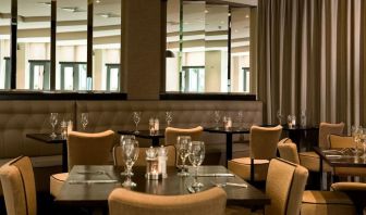 Dining area perfect for coworking at Leonardo Hotel Dublin Christchurch.