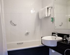 Guest bathroom with shower at Leonardo Hotel Cork.