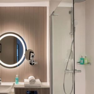 Guest bathroom with shower at Leonardo Royal Hotel Edinburgh.