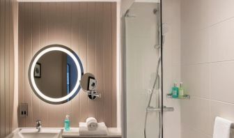 Guest bathroom with shower at Leonardo Royal Hotel Edinburgh.