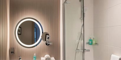 Guest bathroom with shower at Leonardo Royal Hotel Edinburgh.