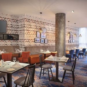 Dining area perfect for coworking at Leonardo Hotel Exeter.