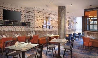 Dining area perfect for coworking at Leonardo Hotel Exeter.