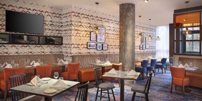 Dining area perfect for coworking at Leonardo Hotel Exeter.