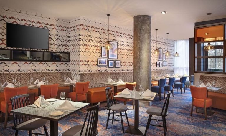 Dining area perfect for coworking at Leonardo Hotel Exeter.