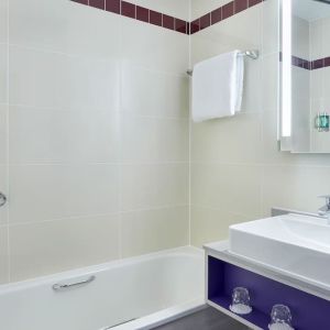 Guest bathroom with shower at Leonardo Hotel Exeter.