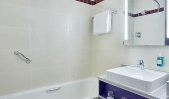 Guest bathroom with shower at Leonardo Hotel Exeter.