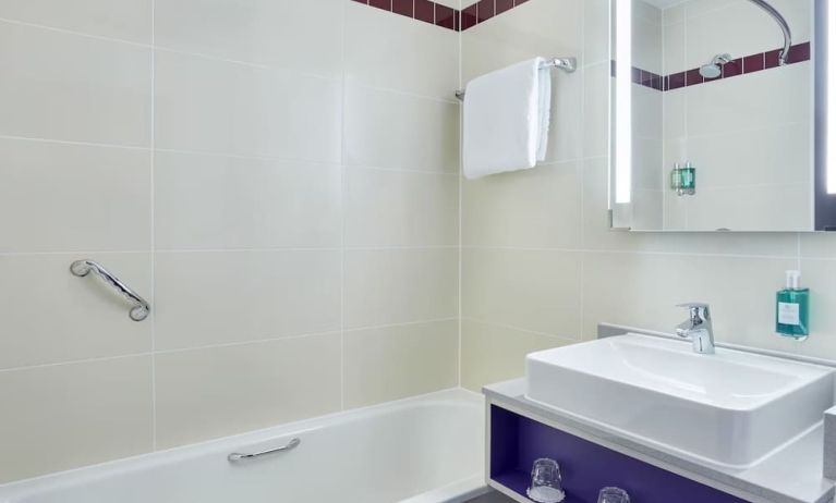 Guest bathroom with shower at Leonardo Hotel Exeter.