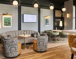 Lobby and coworking lounge at Leonardo Royal Hotel Glasgow.