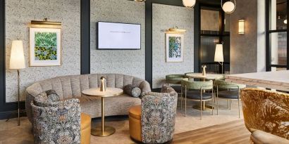 Lobby and coworking lounge at Leonardo Royal Hotel Glasgow.