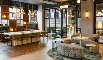 Lobby and coworking lounge at Leonardo Royal Hotel Glasgow.