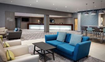 Lobby and coworking lounge at Leonardo Royal Hotel Oxford.