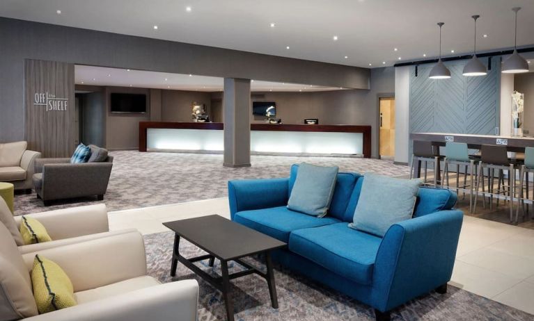 Lobby and coworking lounge at Leonardo Royal Hotel Oxford.