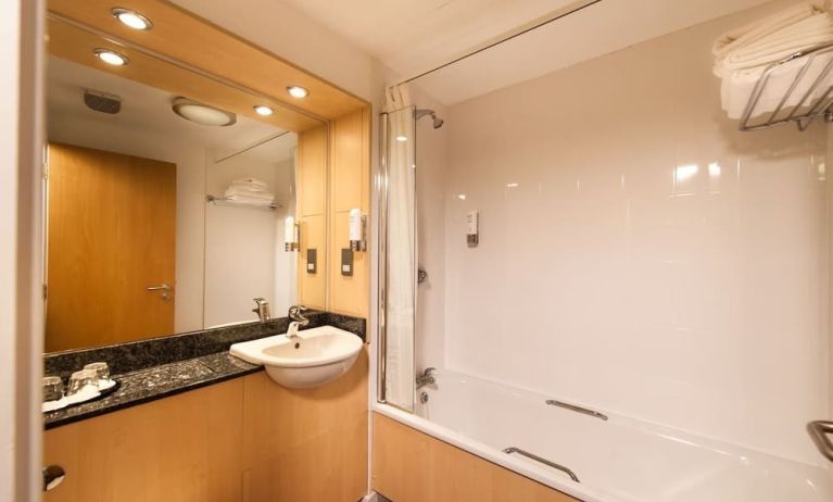 Guest bathroom with shower at Leonardo Inn Aberdeen Airport.