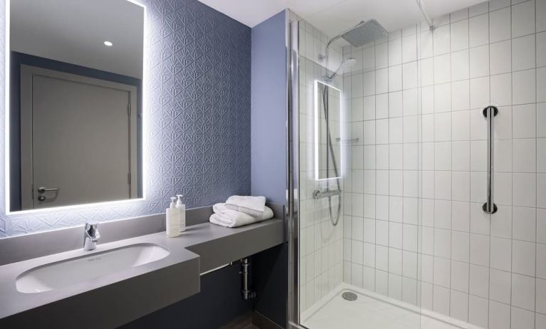 Guest bathroom with shower at Leonardo Hotel Bristol City.
