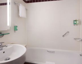 Private guest bathroom at Leonardo Hotel London Watford.