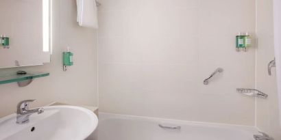 Private guest bathroom at Leonardo Hotel London Watford.