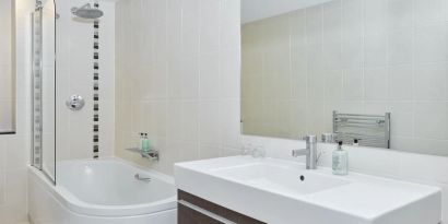 Guest bathroom with shower at Leonardo Hotel Edinburgh Murrayfield.