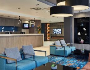 Lobby and coworking lounge at Leonardo Hotel Edinburgh Murrayfield.