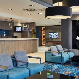 Lobby and coworking lounge at Leonardo Hotel Edinburgh Murrayfield.