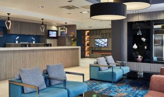 Lobby and coworking lounge at Leonardo Hotel Edinburgh Murrayfield.