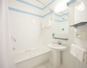 Guest bathroom with shower at Leonardo Hotel Leeds.